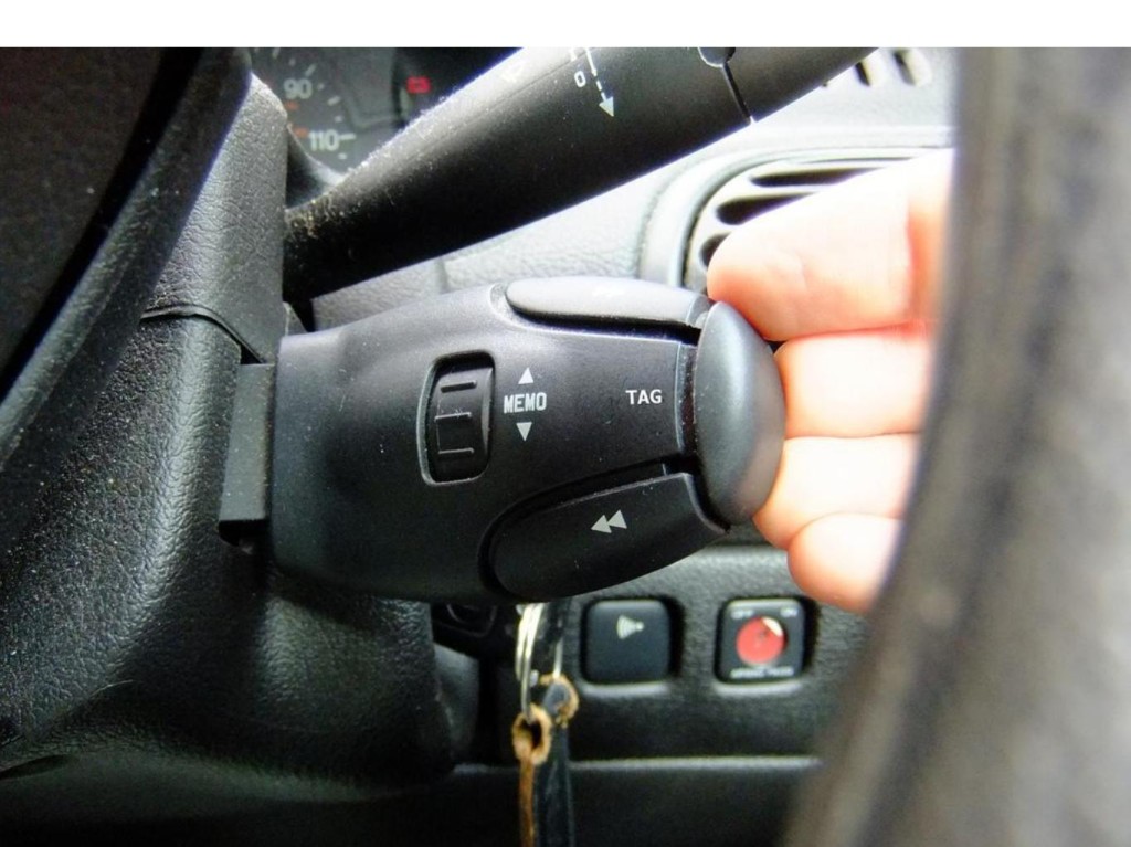 Car tag button